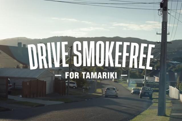 The text 'drive smokefree for tamariki' overlays a photo of a suburban neighbourhood