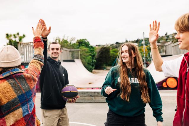 School students high fiving